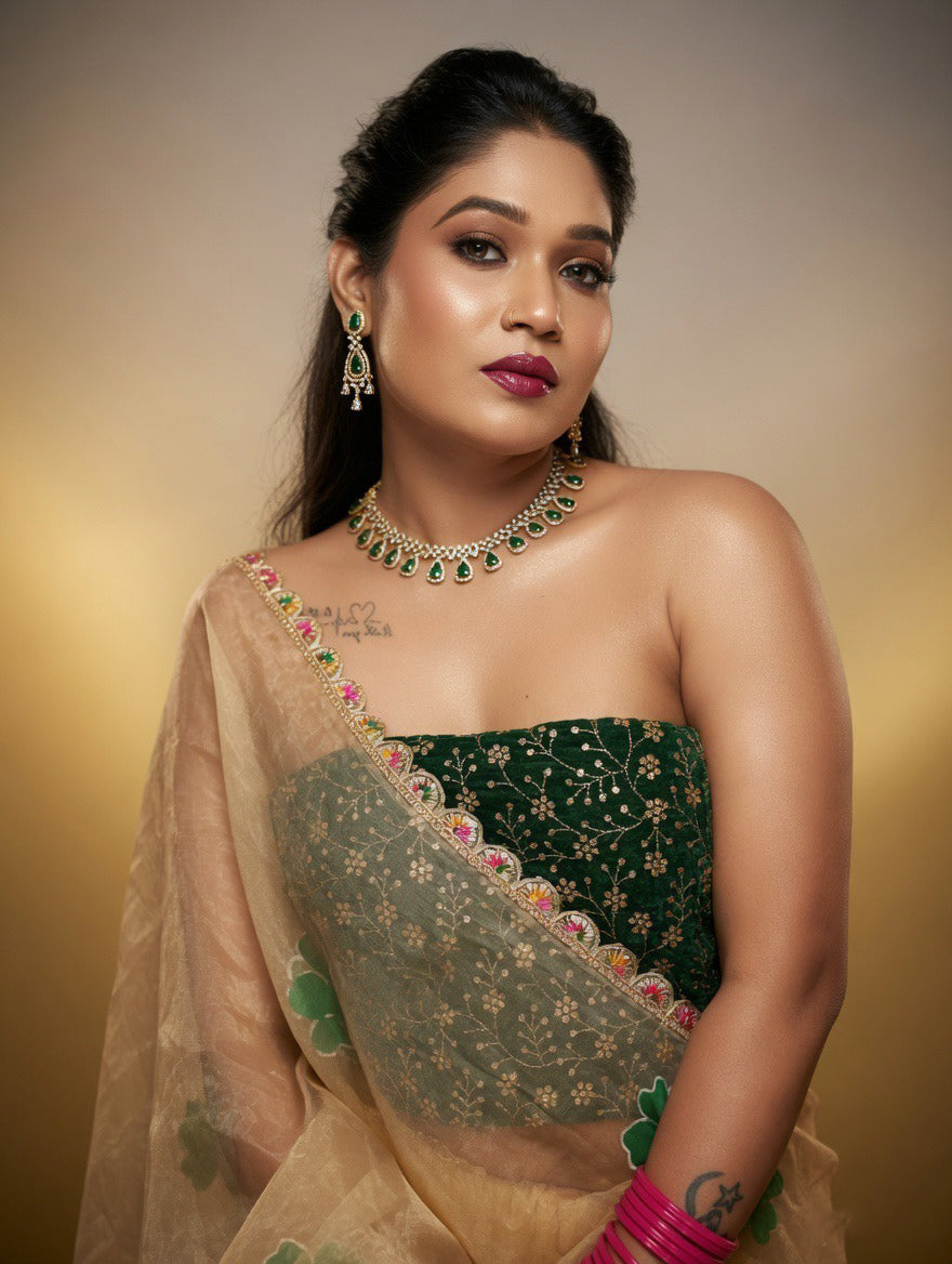 Golden Saree with green painting and Green blouse