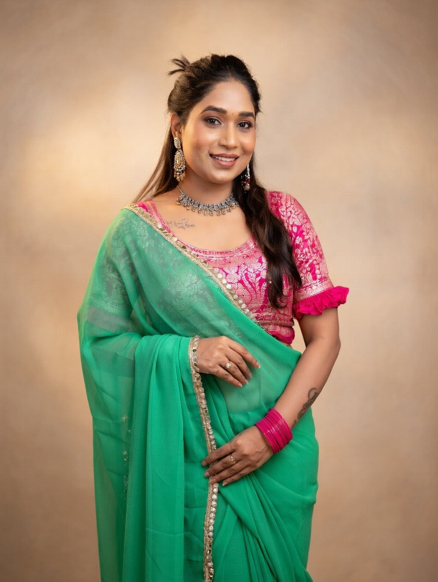 Green saree with pink stitched blouse