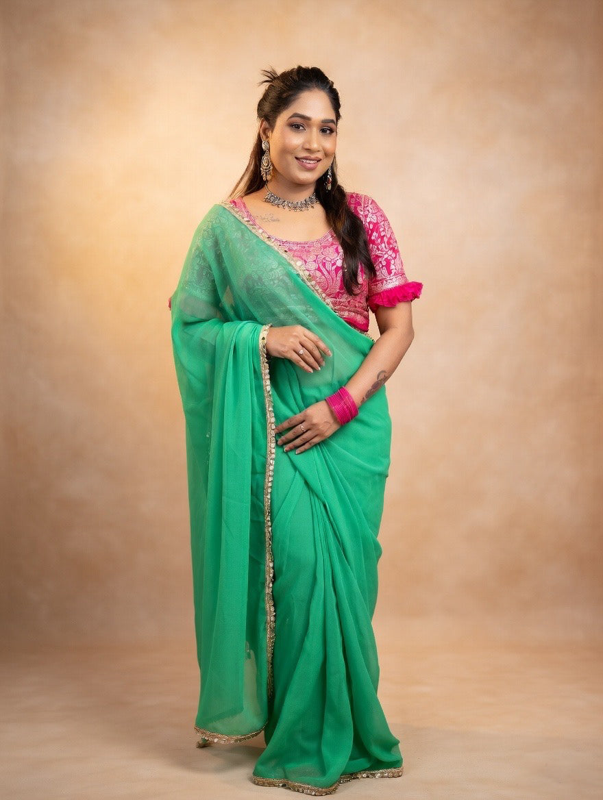 Green saree with pink stitched blouse