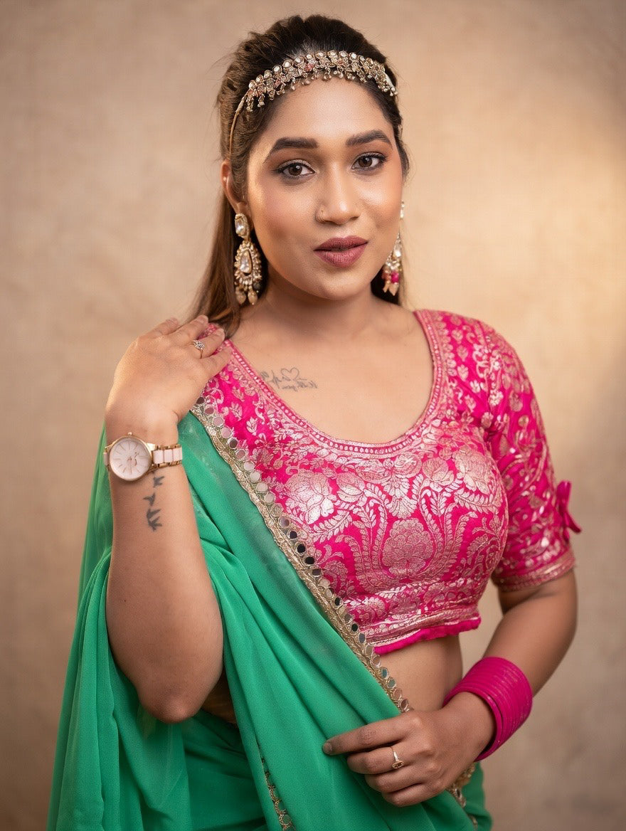 Green saree with pink stitched blouse