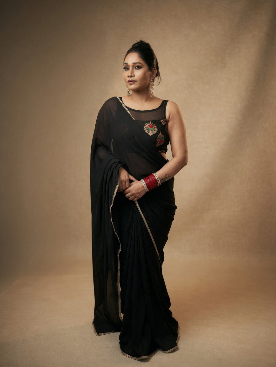 Black Saree with readymade red and black blouse
