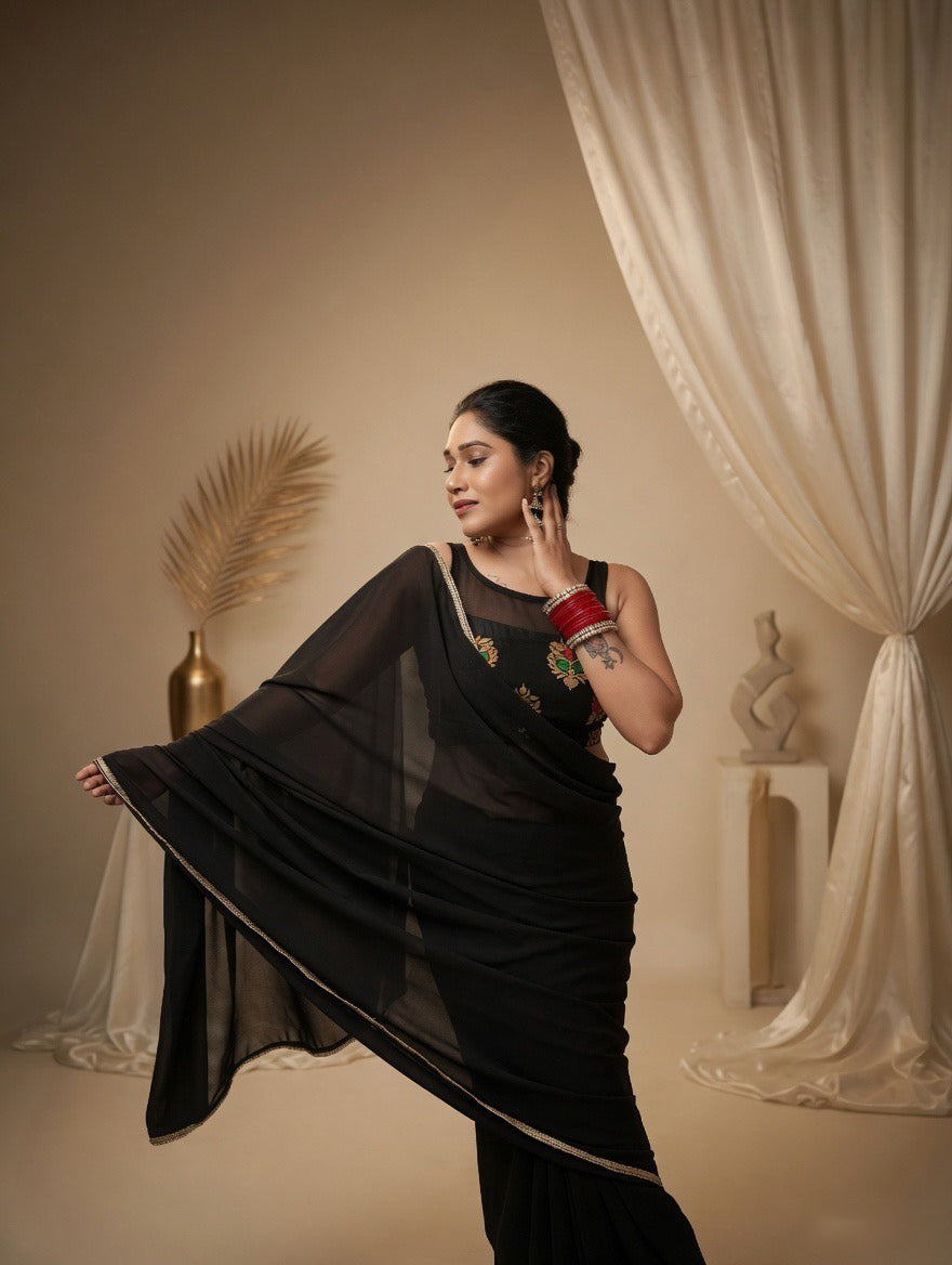 Black Saree with readymade red and black blouse