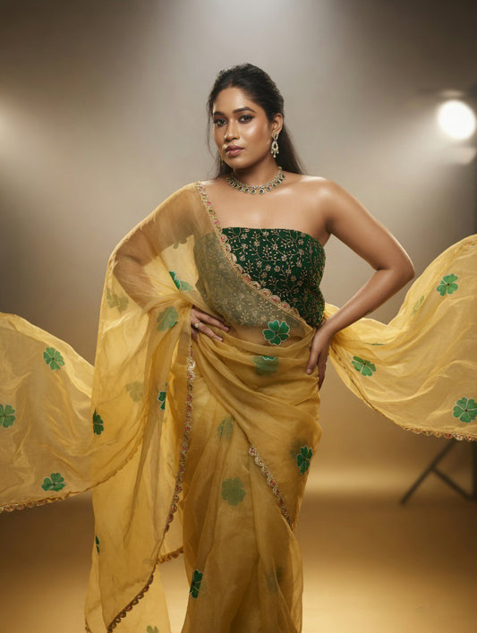 Golden Saree with  green painting and Green blouse