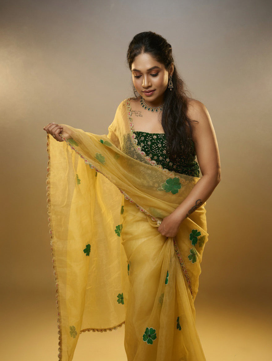 Golden Saree with  green painting and Green blouse