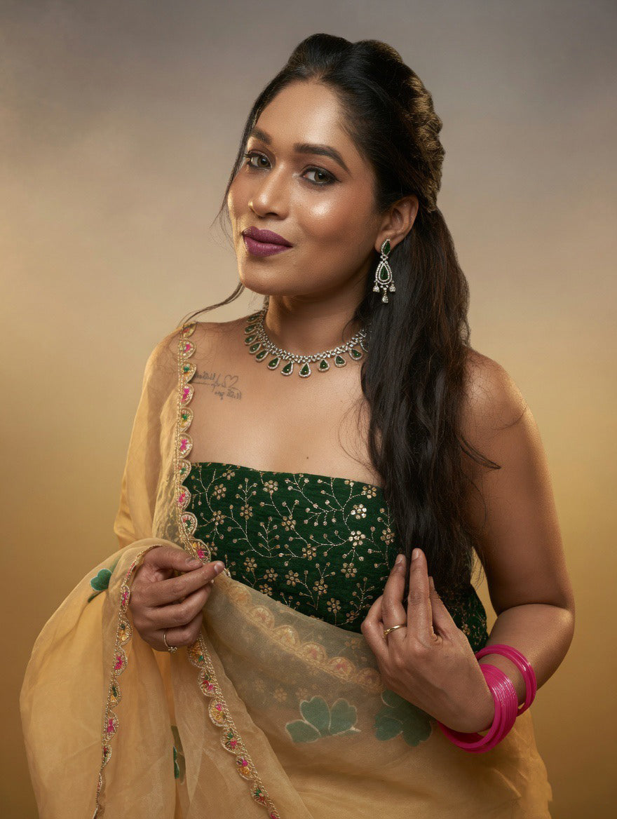 Golden Saree with  green painting and Green blouse