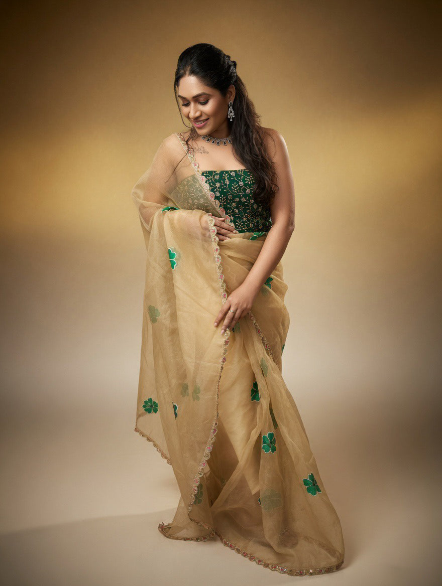 Golden Saree with  green painting and Green blouse