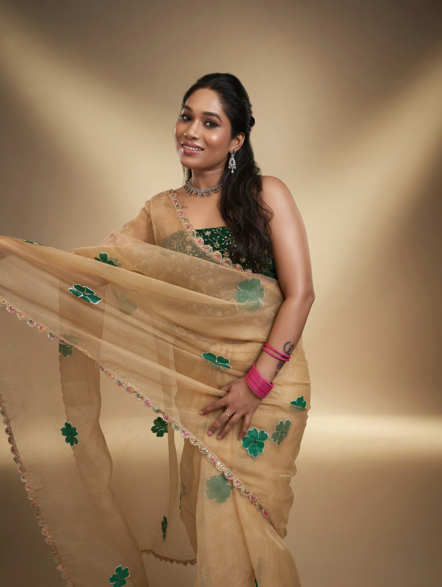 Golden Saree with  green painting and Green blouse