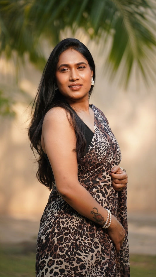 Animal print Saree with black unstitched blouse