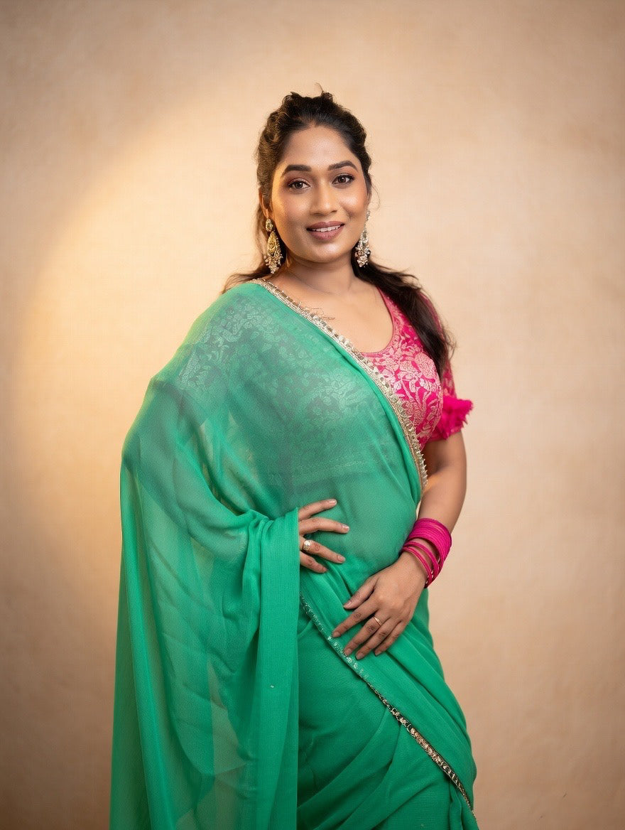 Green saree with pink stitched blouse